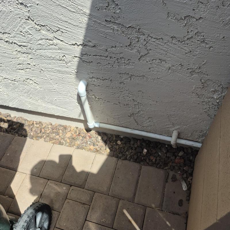 Tankless water heater condensate drain to outside rocks Tankless water heater condensate drain to outside rocks