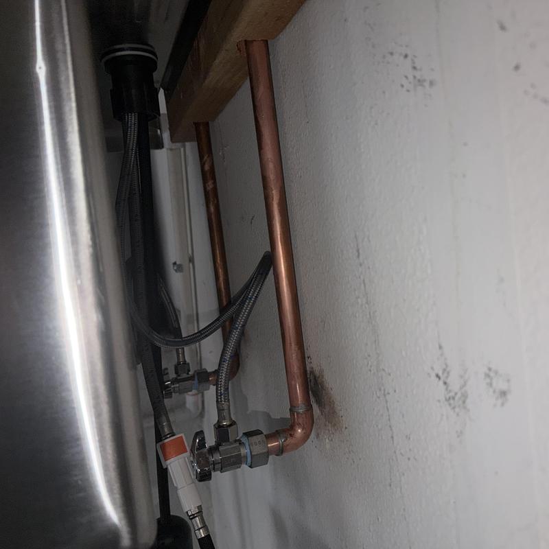 Copper water supply lines under laundry sink installation