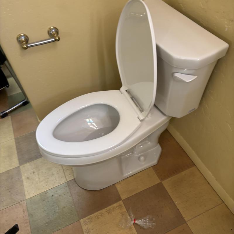 Gerber Banner ADA elongated toilet with open lid Gerber Banner ADA elongated toilet with open lid