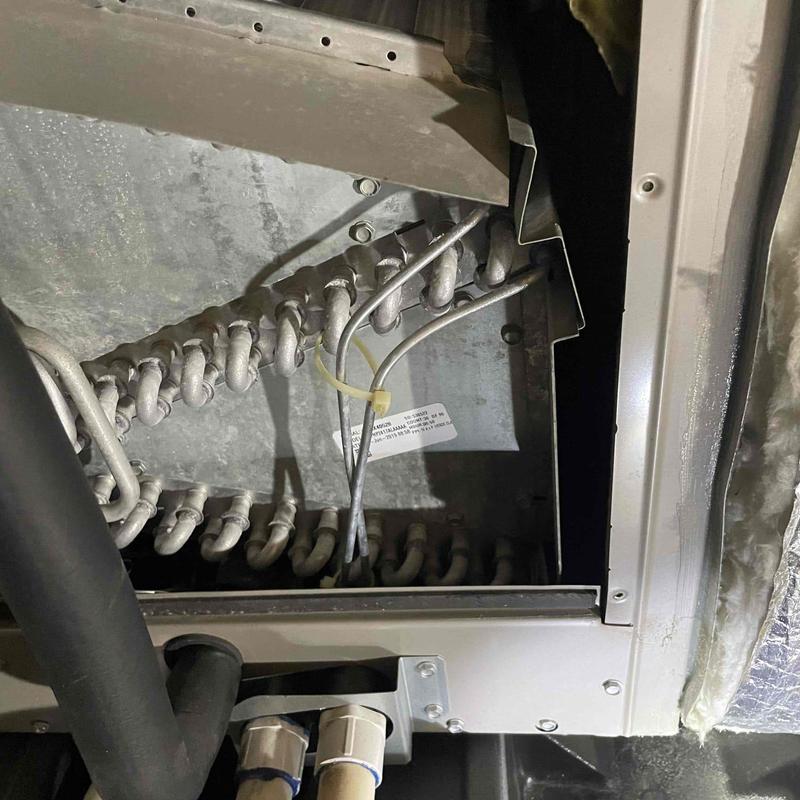 Indoor HVAC evaporator coil with wiring inspection