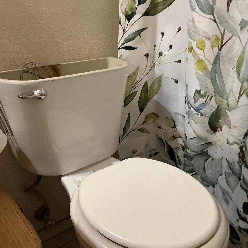 Gerber Banner ADA toilet with open tank lid Gerber Banner ADA toilet with open tank lid