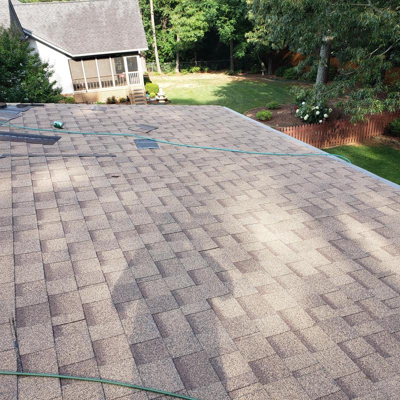 Architectural shingle roof with tools on top