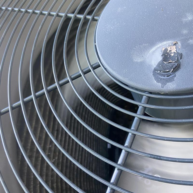 Outdoor air conditioner condenser fan and coils clogged