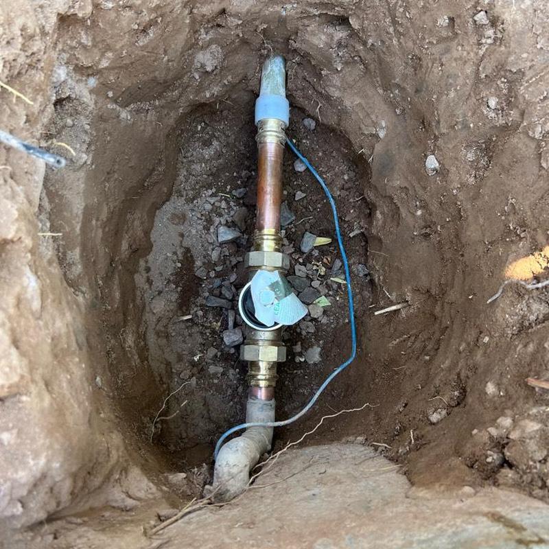 1-inch pressure reducing valve with copper piping in soil