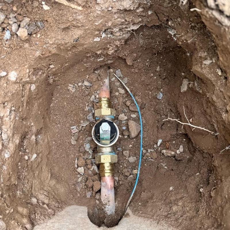 Copper water main with pressure regulator valve installation