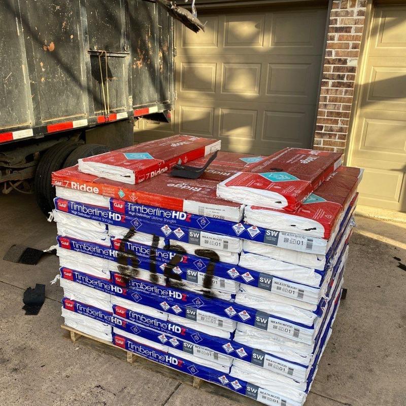 GAF Timberline HDZ shingles stacked on pallet outdoors