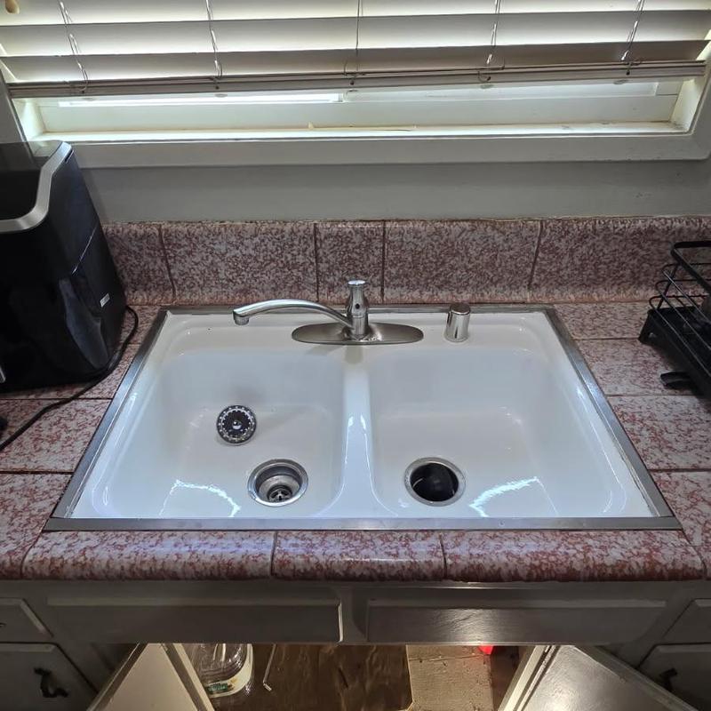 Double kitchen sink with faucet and disposal installation