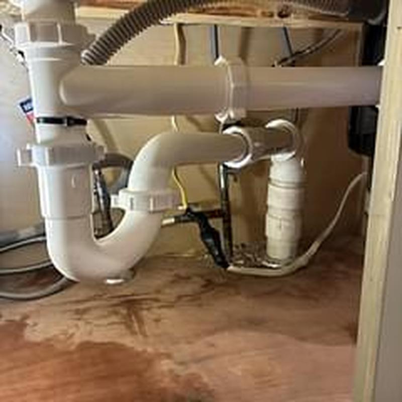 Kitchen drain repiping with PVC pipes under sink