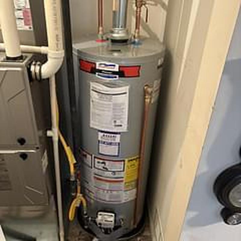 Natural gas water heater installation in utility closet