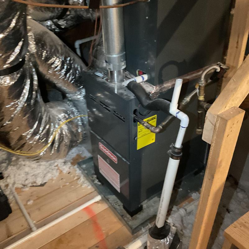 Furnace system with ductwork and piping in attic space