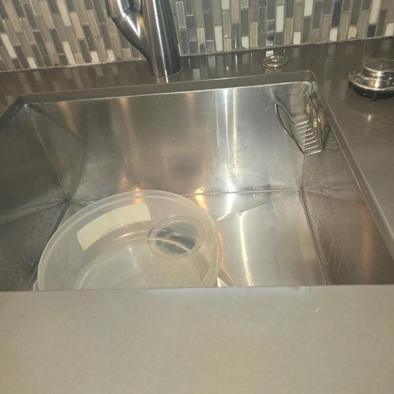 Kitchen sink drain cleared with plumbing snake