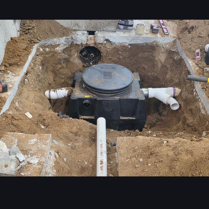 Pilsand interceptor installed in concrete trench