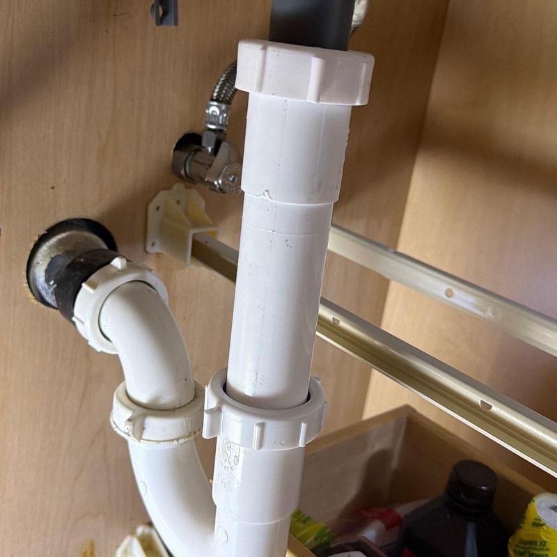 Bathroom sink PVC drain pipe with new fittings