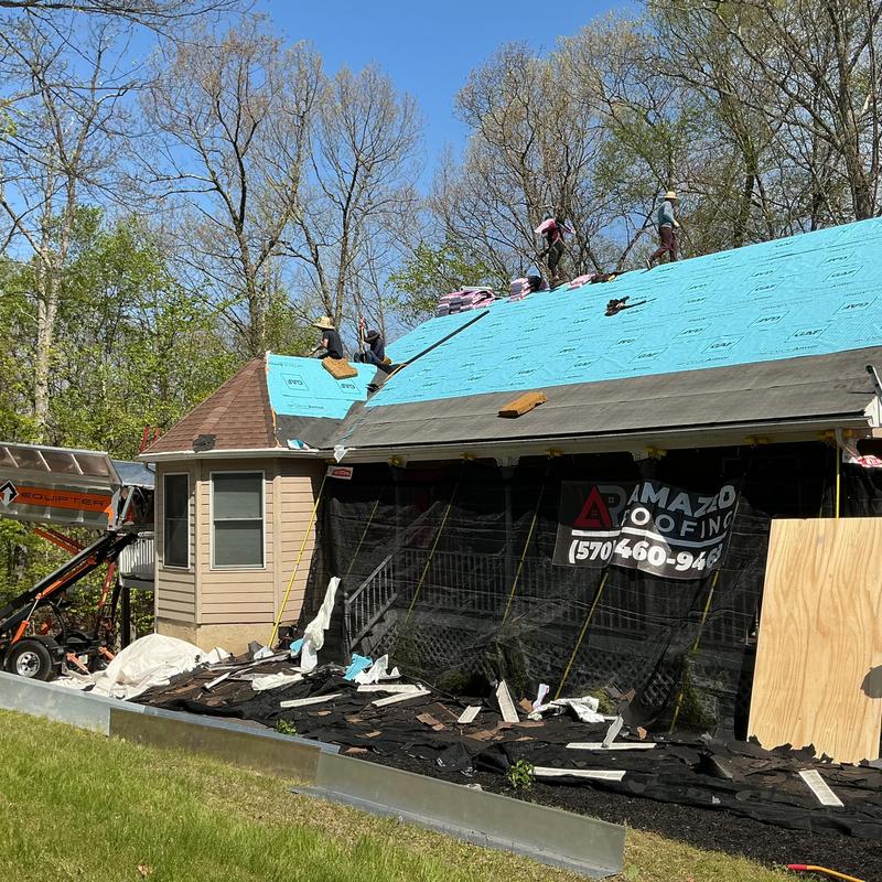Roof underlayment installation on house roof in East Stroudsburg Roof underlayment installation on house roof in East Stroudsburg