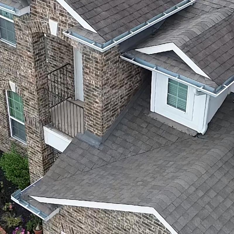 Wall flashing and roofing shingles replacement on home roof