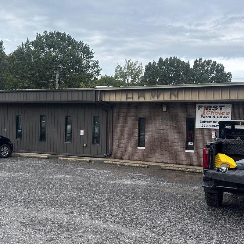 Commercial metal roof with hail damage at business