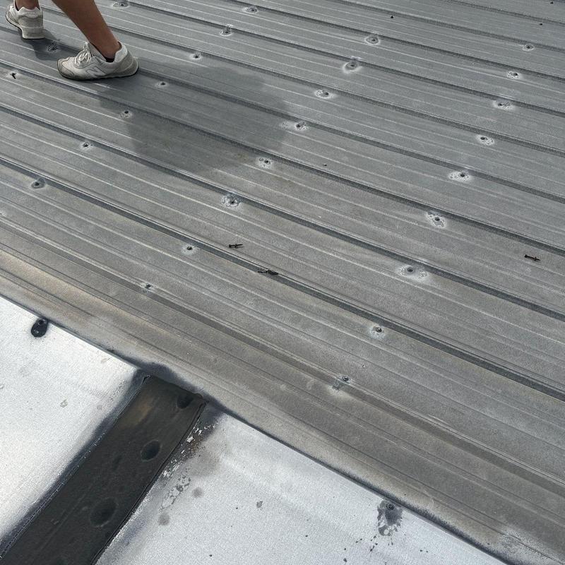 Metal commercial roof hail damage inspection in Kentucky