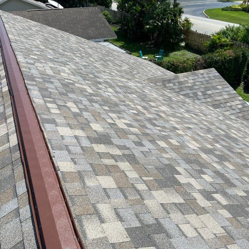 Owens Corning Duration shingle roof with metal ridge cap
