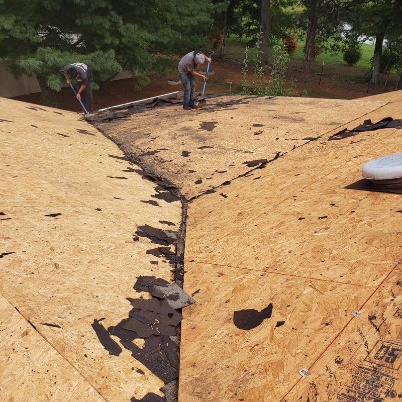 GAF Heatherwood shingle roof tear-off in progress