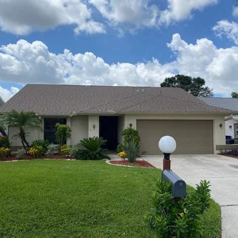 Shingle roof replacement on suburban home in Florida