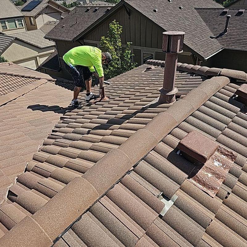 Tile roof inspection with roof tuna on residential home Tile roof inspection with roof tuna on residential home
