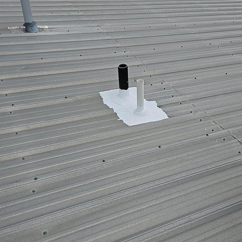 Pipe jack seals on gray metal panel roof Pipe jack seals on gray metal panel roof