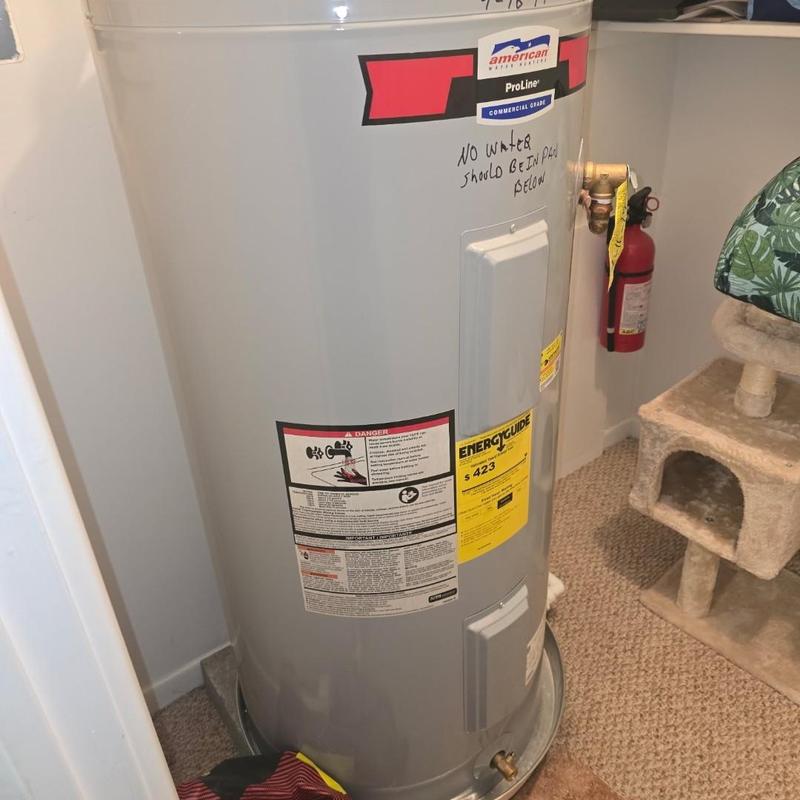 Water heater with safety warnings and energy guide label