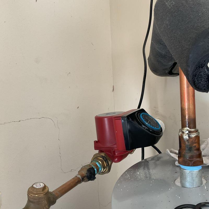Recirculating pump installed on copper piping