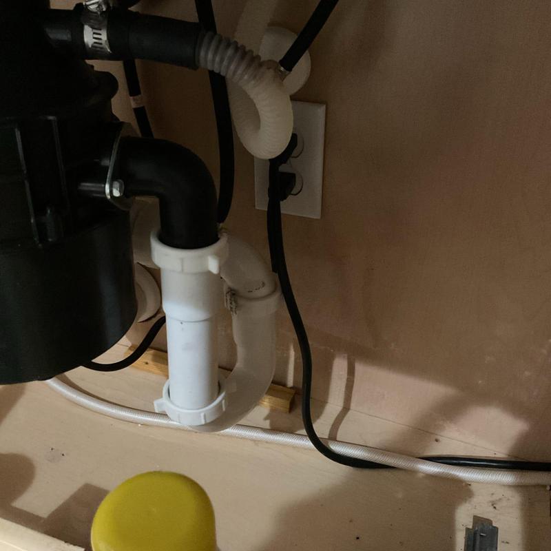 Kitchen sink p-trap and drain pipes under cabinet