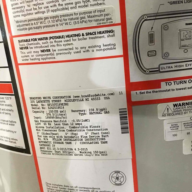 Water heater label with model and safety info details