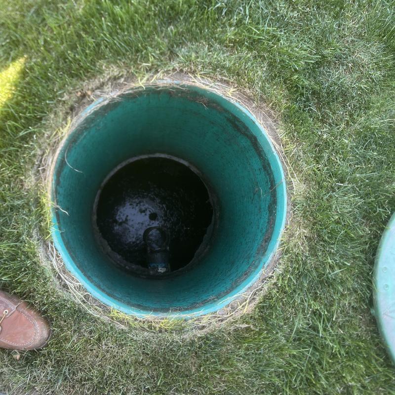 Septic tank pump chamber opened for inspection