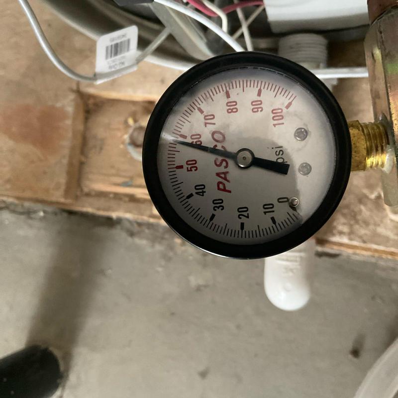 Expansion tank pressure gauge on water heater system