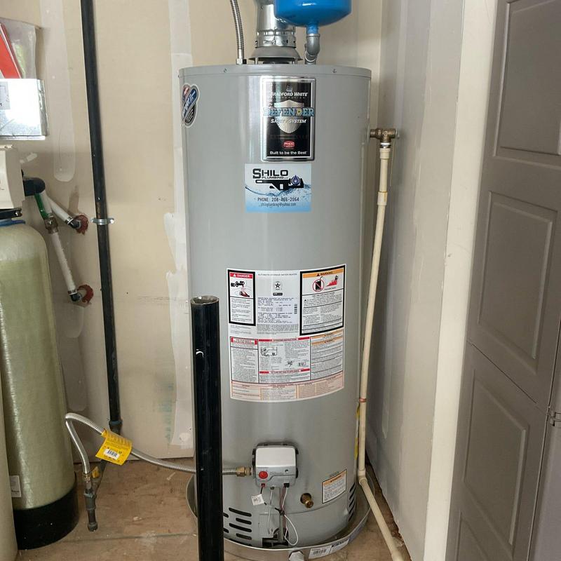 Expansion tank on gas water heater with piping
