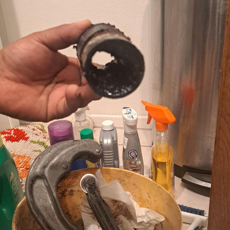 Kitchen sink drain pipe with corrosion buildup