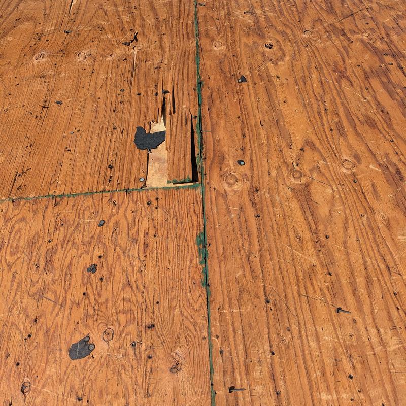 Roof decking with wood rot and damage detail