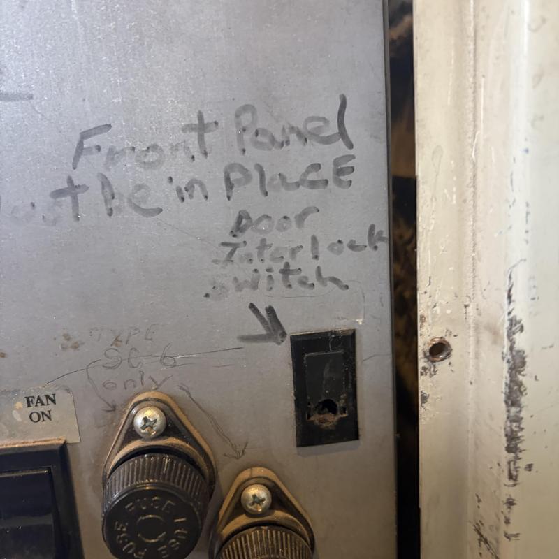 Door interlock switch on HVAC control panel