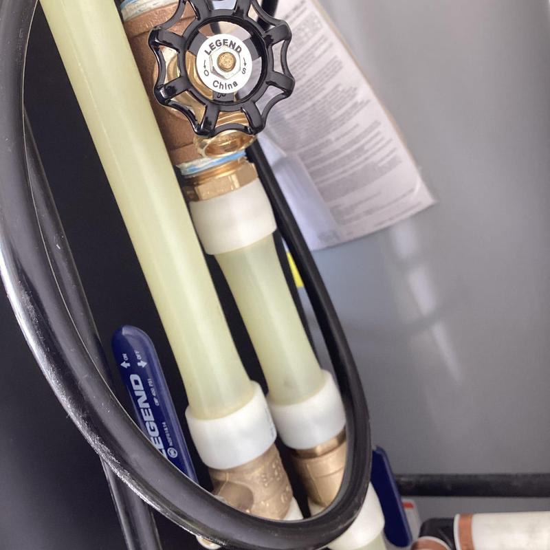 Water softener plumbing valves and piping installation