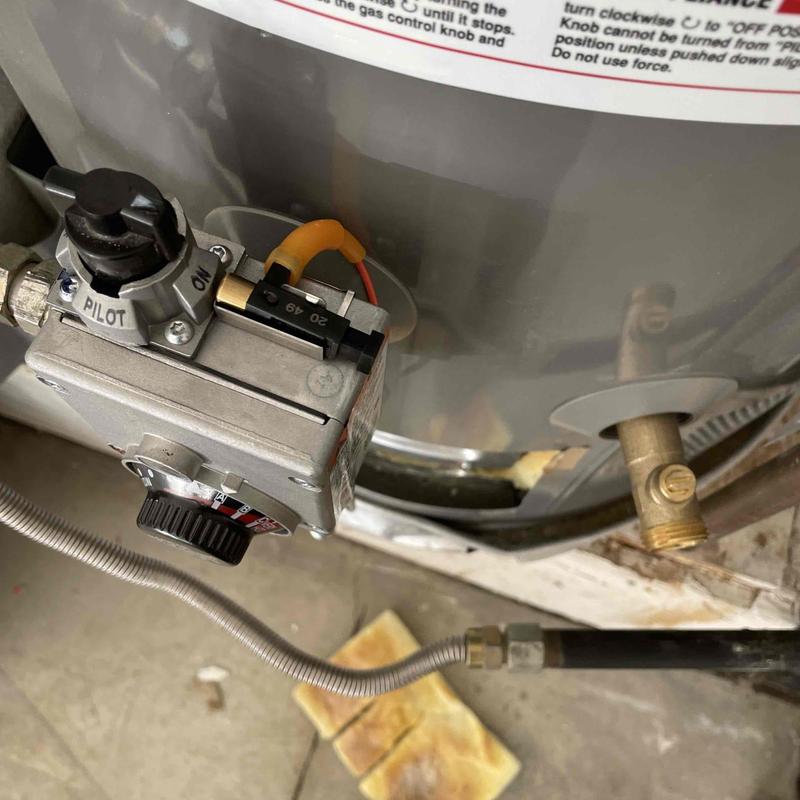 Water heater pilot igniter and control valve close-up