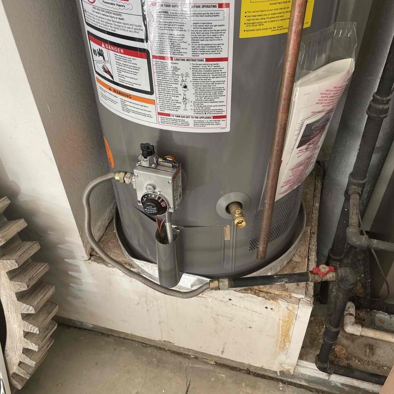 Water heater ignition system with gas and pilot components
