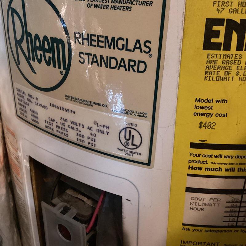 Electric water heater label and wiring panel