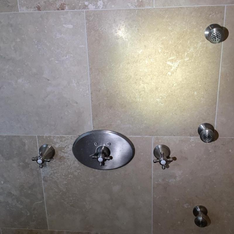 Santec shower valve and trim on tiled wall Santec shower valve and trim on tiled wall