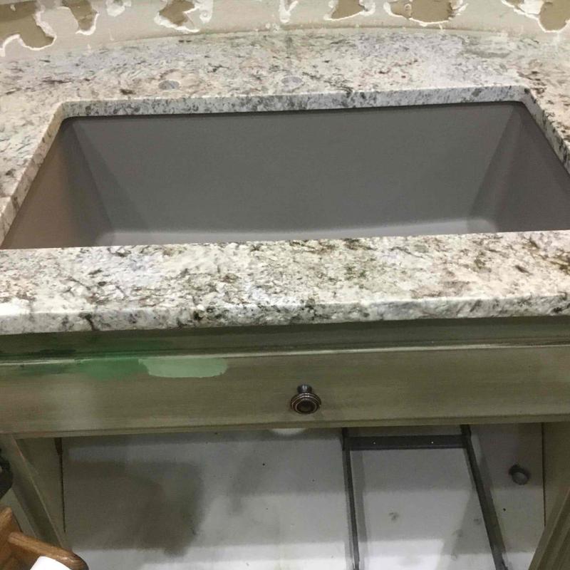 Kitchen sink cutout in new granite countertop installation