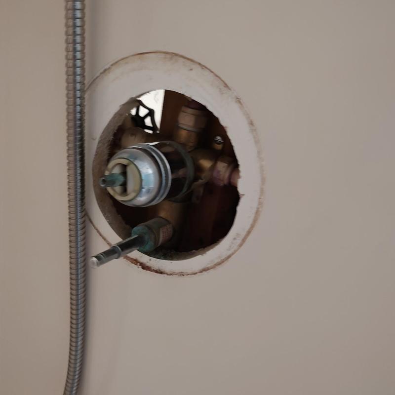 Delta shower valve inside wall cavity with plumbing connections Delta shower valve inside wall cavity with plumbing connections