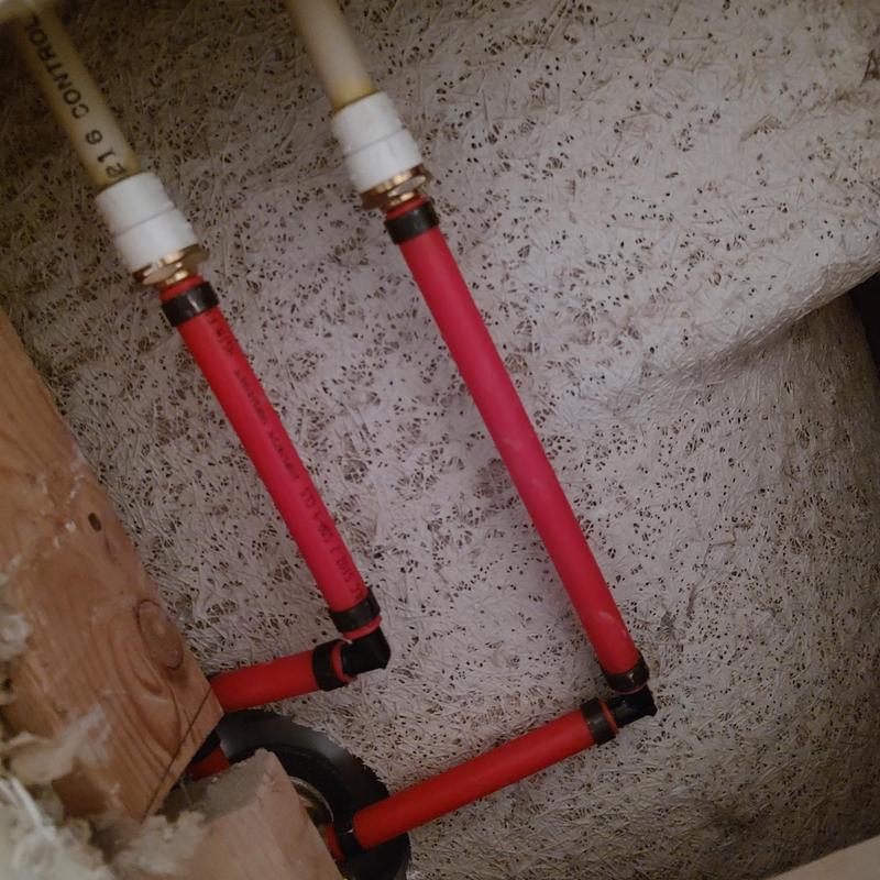 PEX water supply lines with fittings in wall cavity PEX water supply lines with fittings in wall cavity