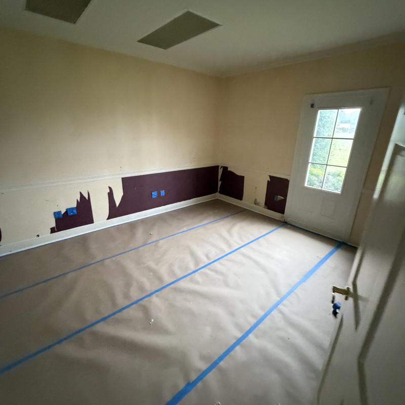 Flooring covered with protective paper for demo work