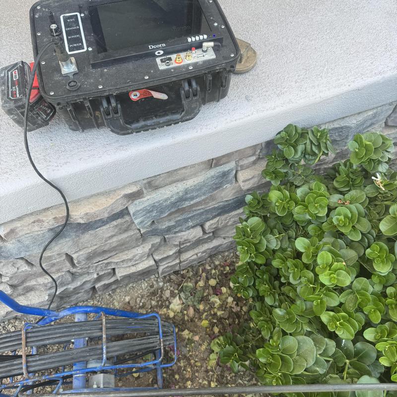 Sewer line inspection camera and monitor setup outdoors Sewer line inspection camera and monitor setup outdoors