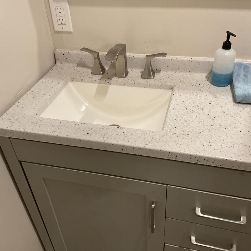 Lavatory faucet and sink with soap dispenser and towel