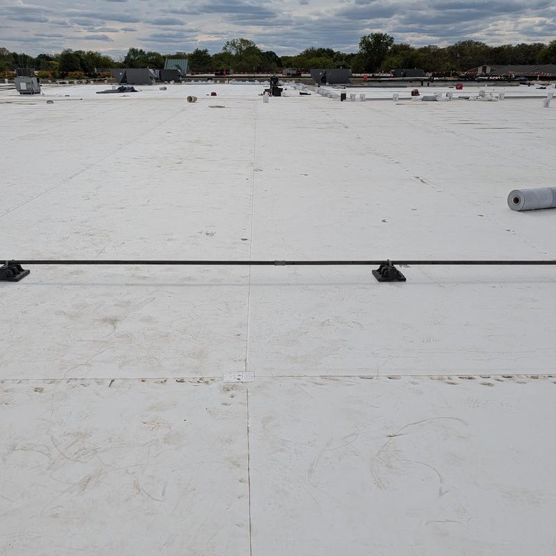 TPO single ply roof with safety railing system