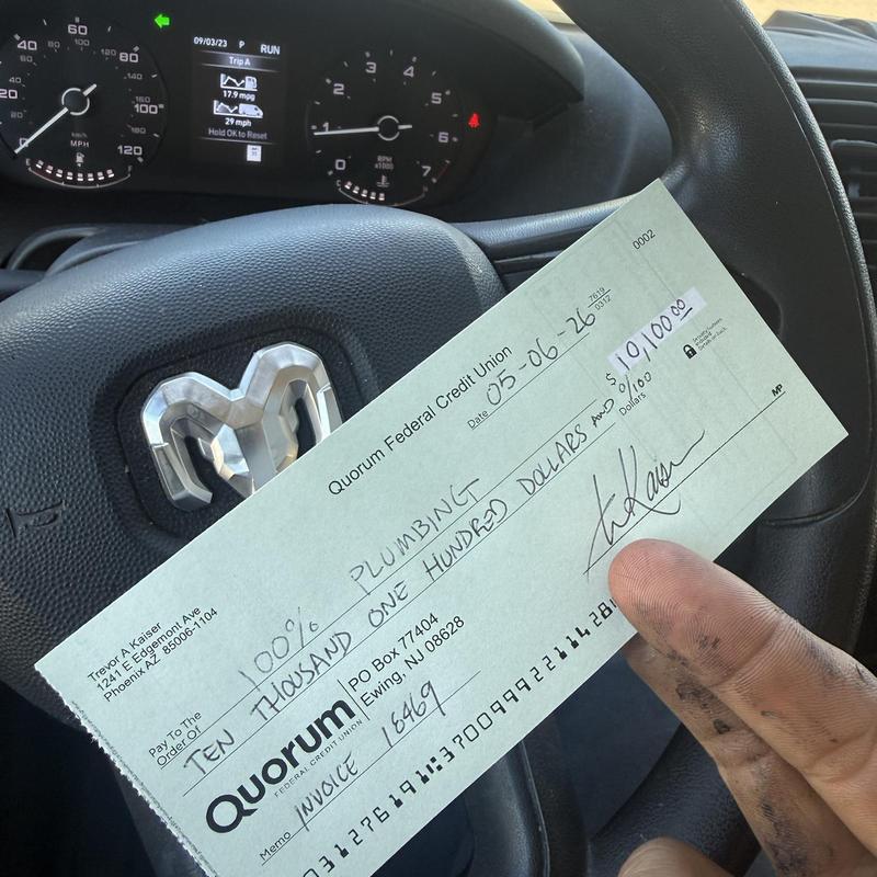 Plumbing service payment check for $10,100 in truck Plumbing service payment check for $10,100 in truck
