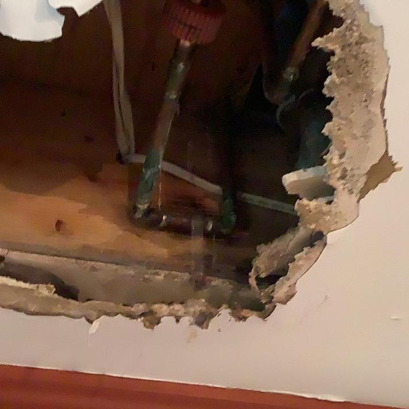 Copper waterline pipe inside ceiling with hole cut Copper waterline pipe inside ceiling with hole cut